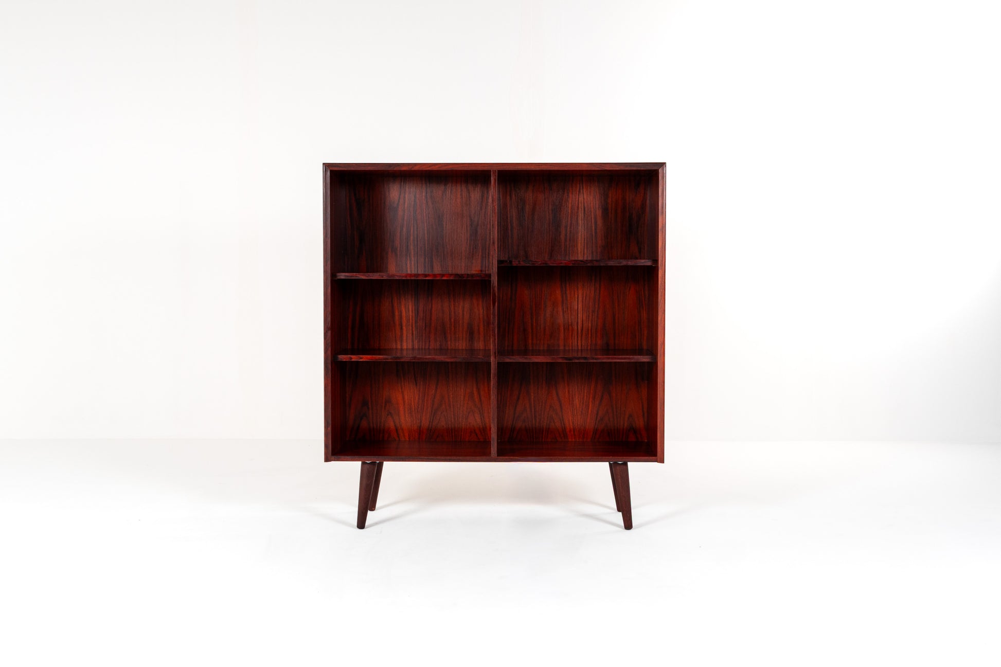 1960s Scandinavian rosewood bookcase on tapered legs