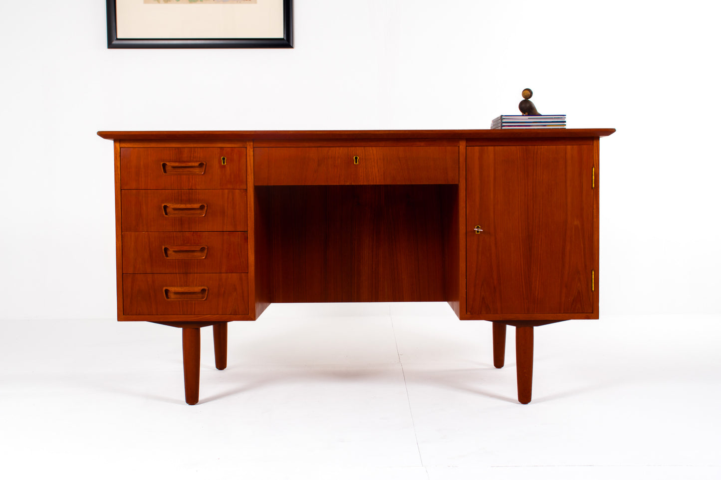 Teak mid-century desk with bookcase back and storage drawers