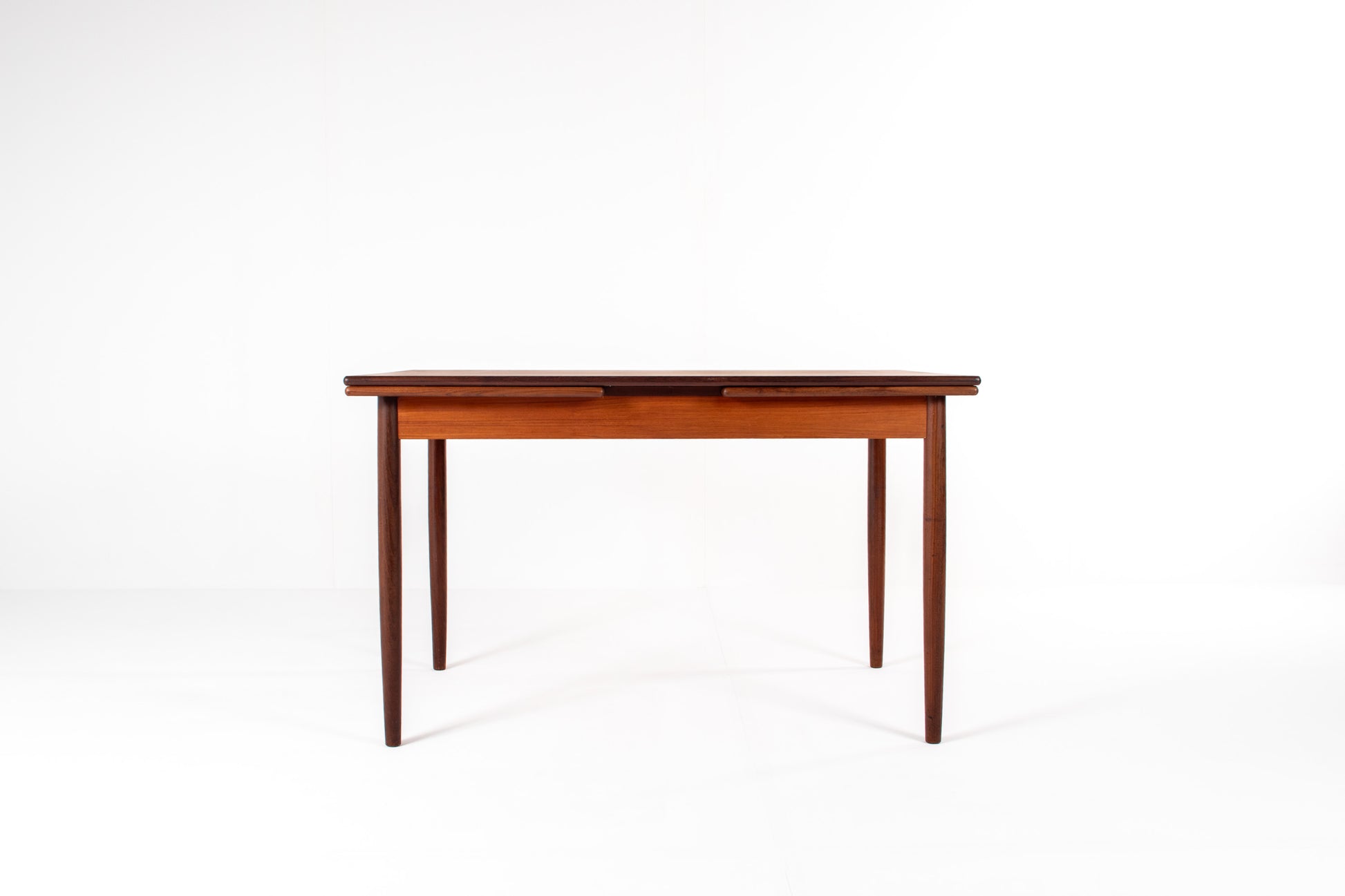 Danish modern teak dining table with extension leaves
