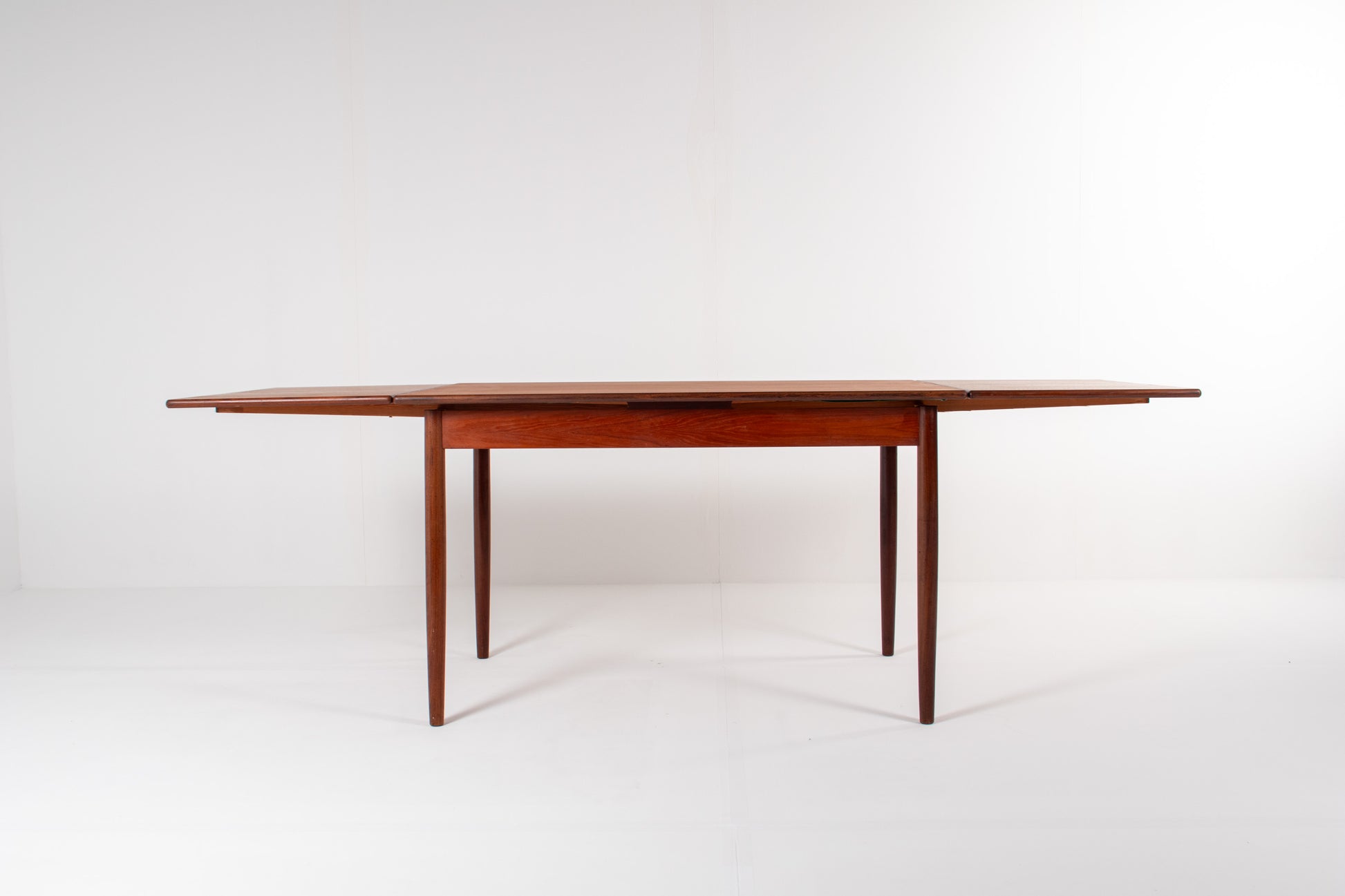 1960s teak dining table extended with two leaves