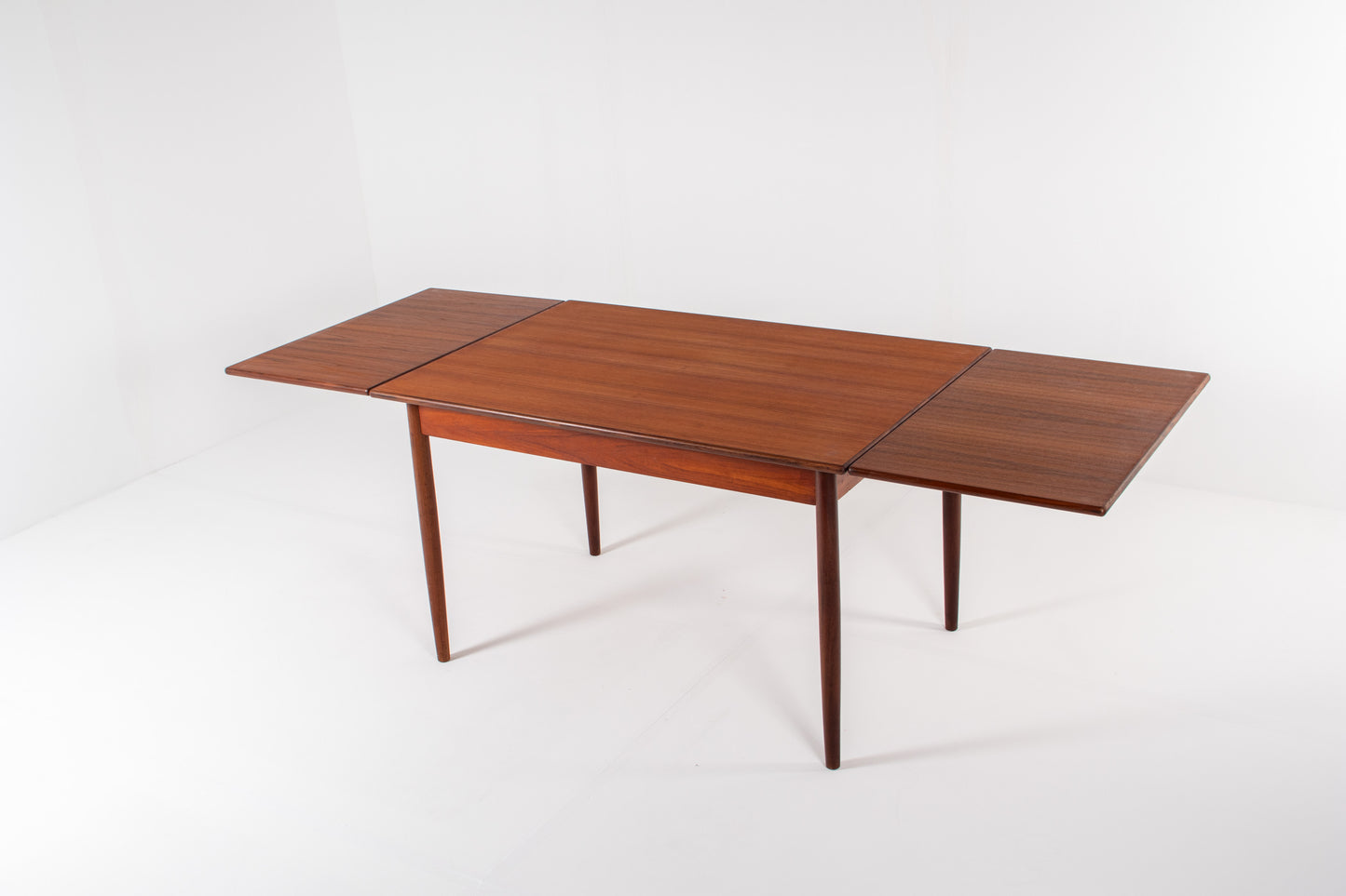 1960s teak dining table extended with two leaves