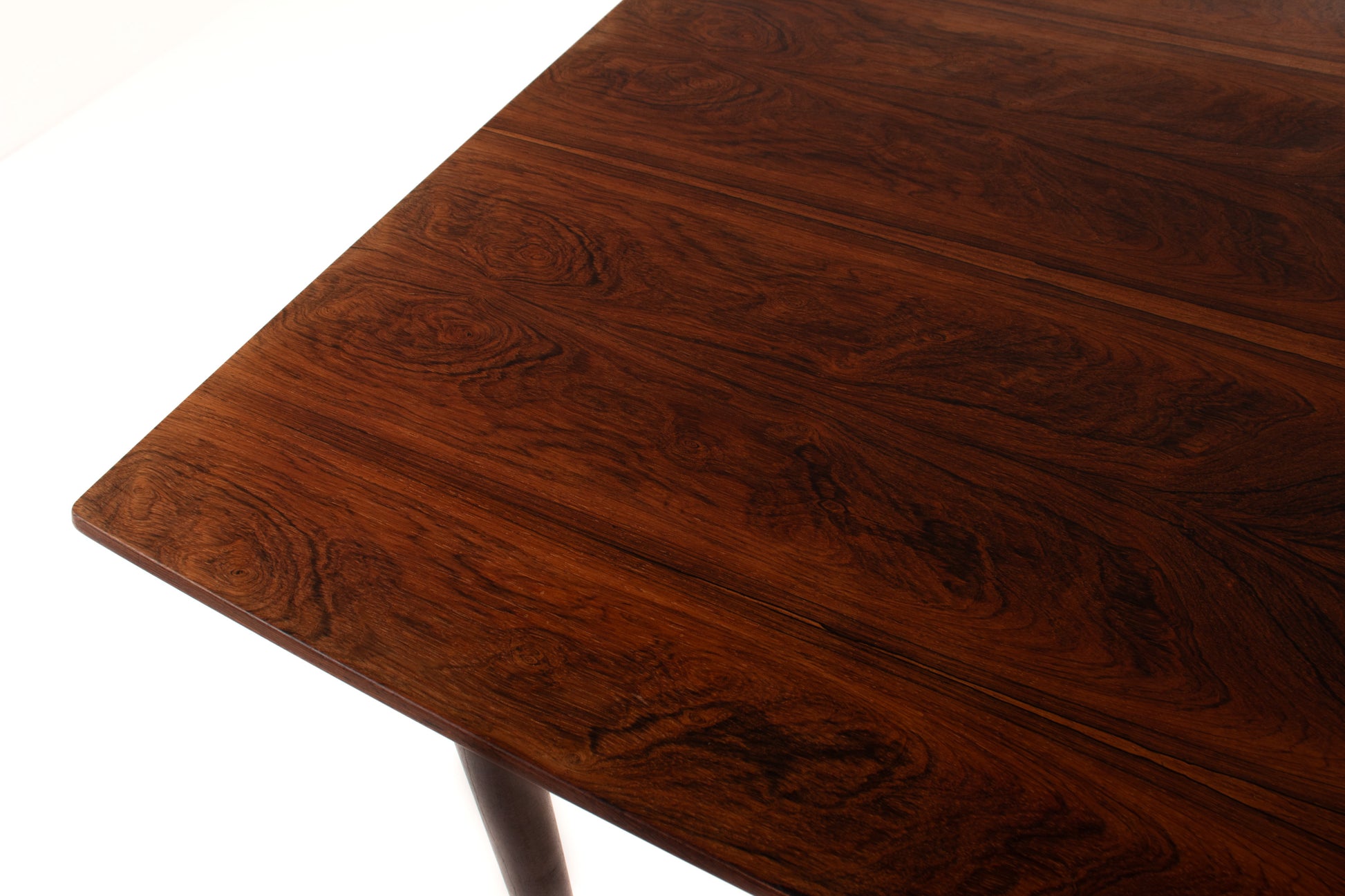 rosewood grain on mid-century dining table