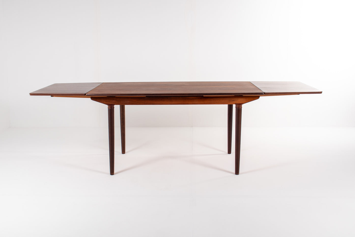 Vintage Danish rosewood extendable table with double leaves