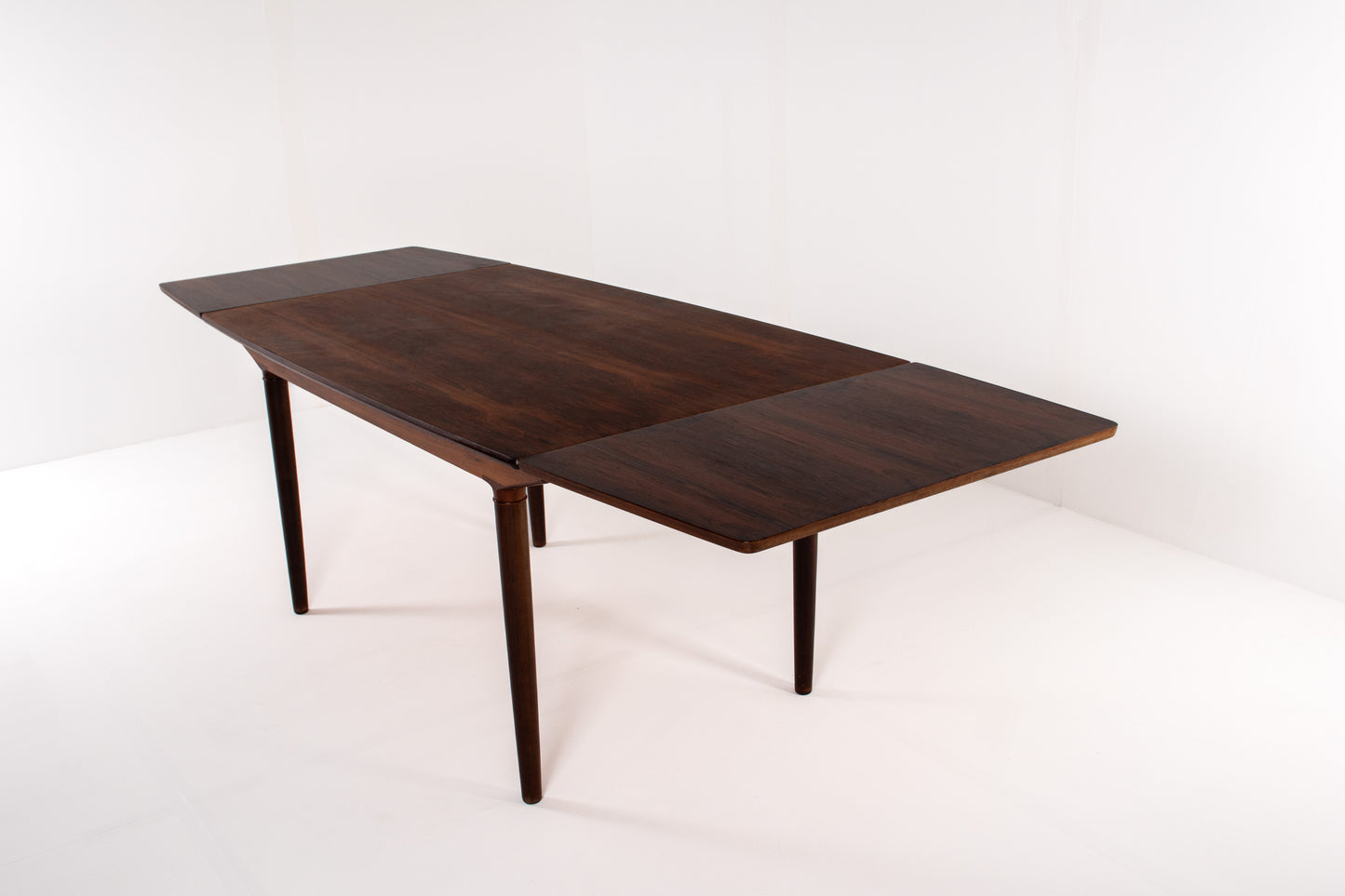 Vintage Danish rosewood extendable table with double leaves