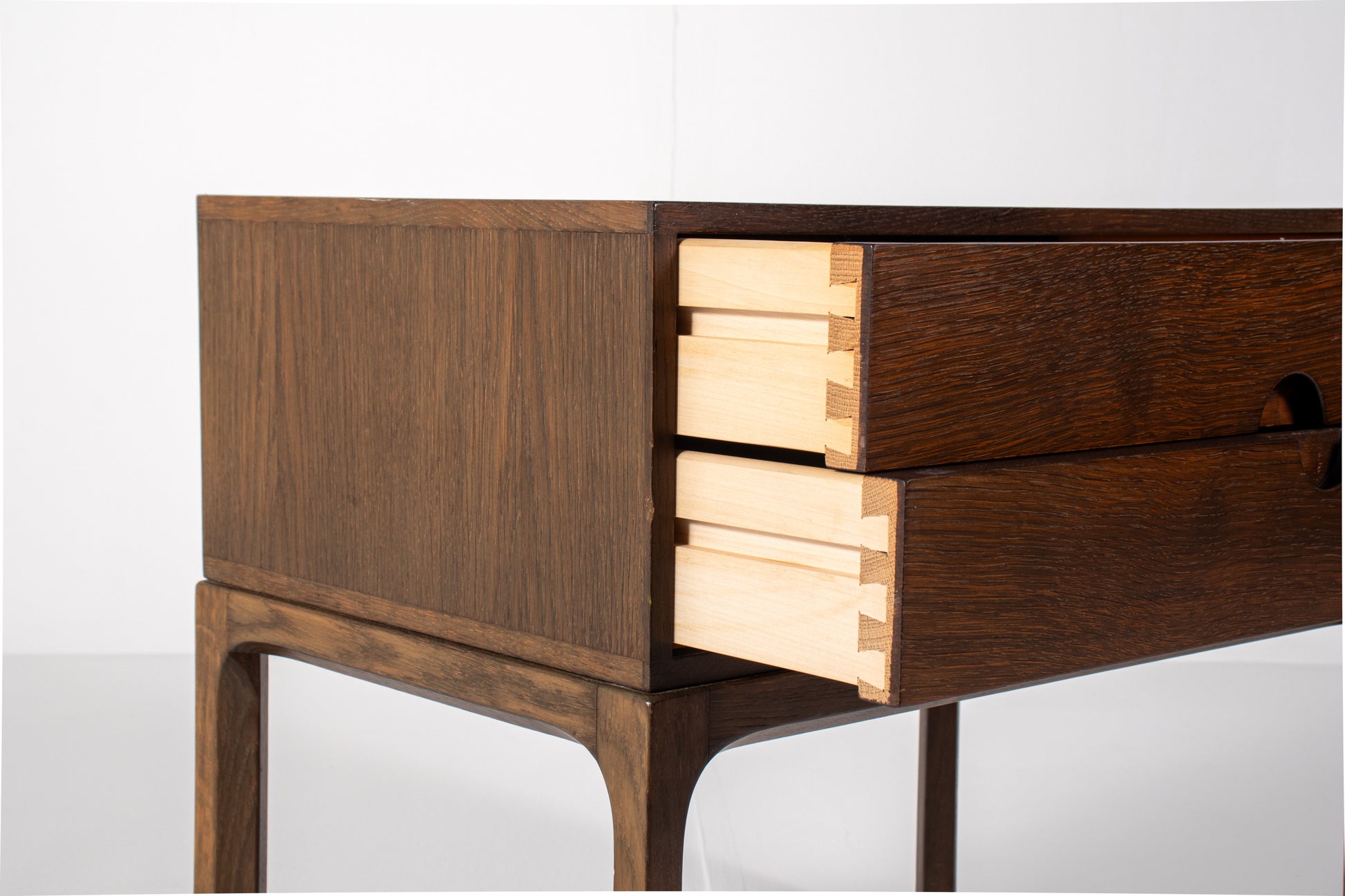 Detail of circular recessed drawer pull Danish modern console