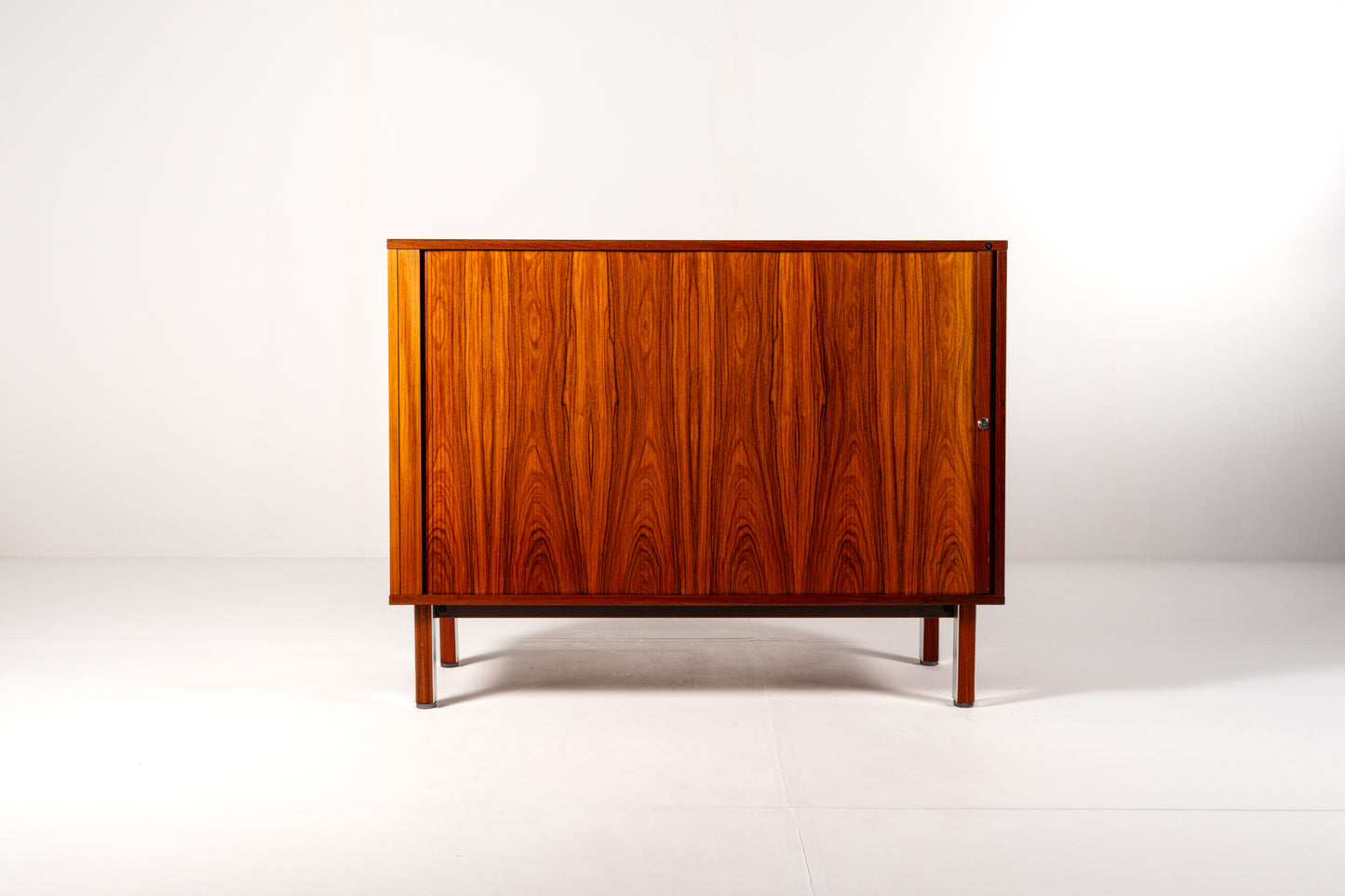 Mid-century modern rosewood cabinet with sliding doors