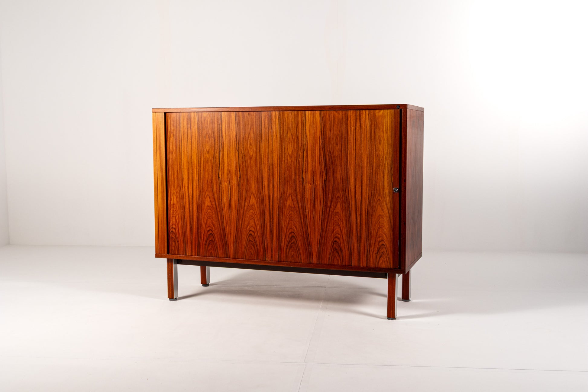 Mid-century modern rosewood cabinet with sliding doors