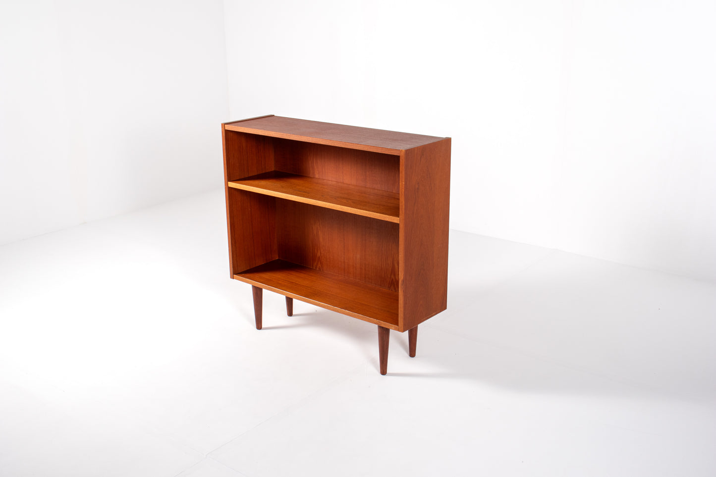 Angled view of vintage Danish teak bookcase by Sejling Skabe