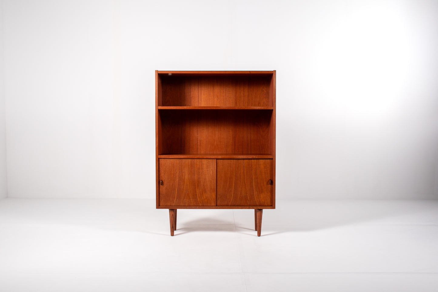 Danish teak bookcase with open shelves and sliding doors