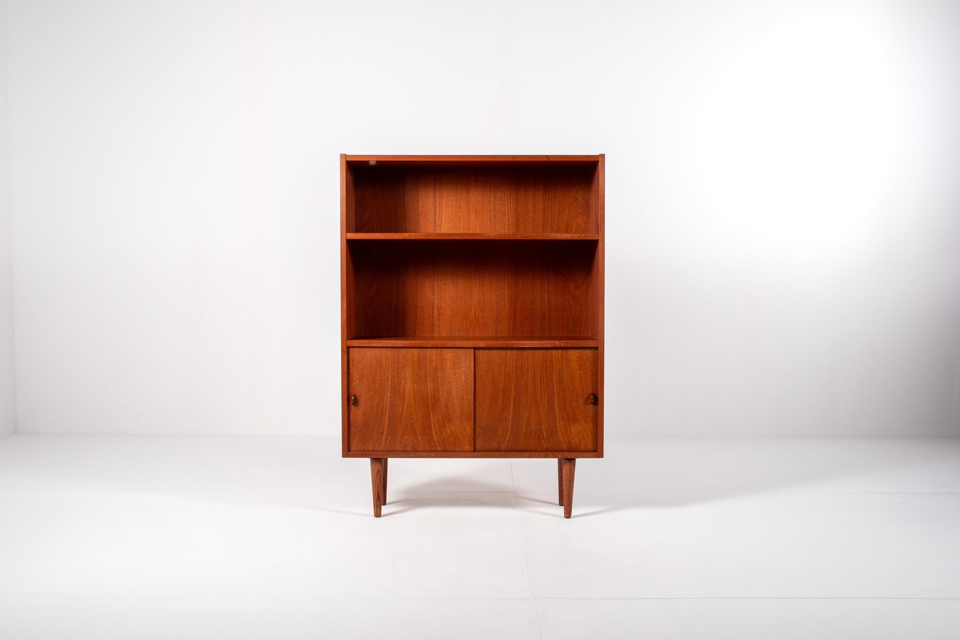 Danish teak bookcase with open shelves and sliding doors