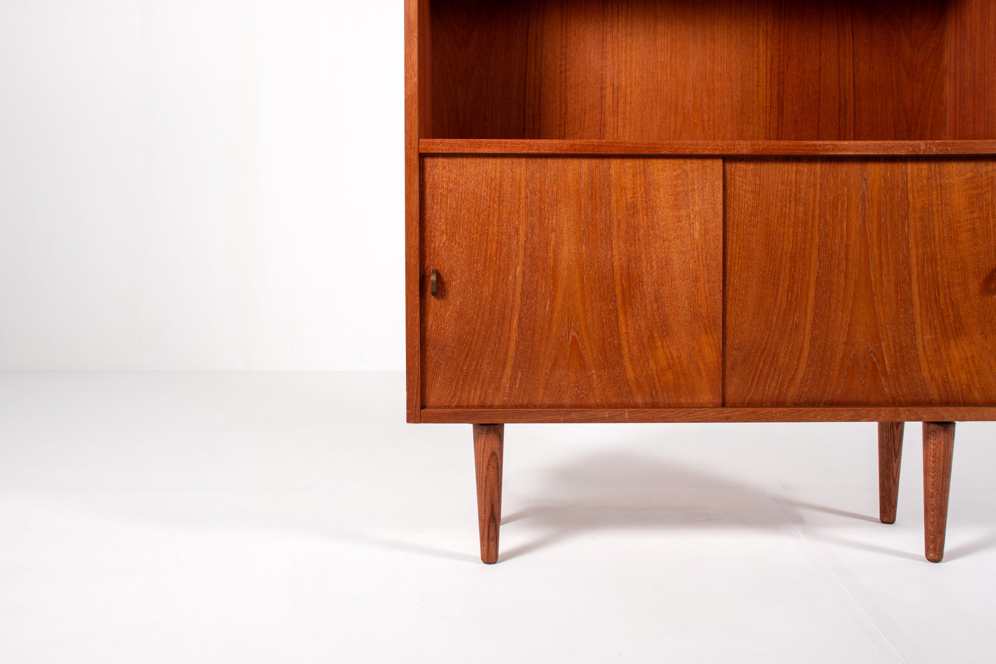 Danish teak bookcase with open shelves and sliding doors