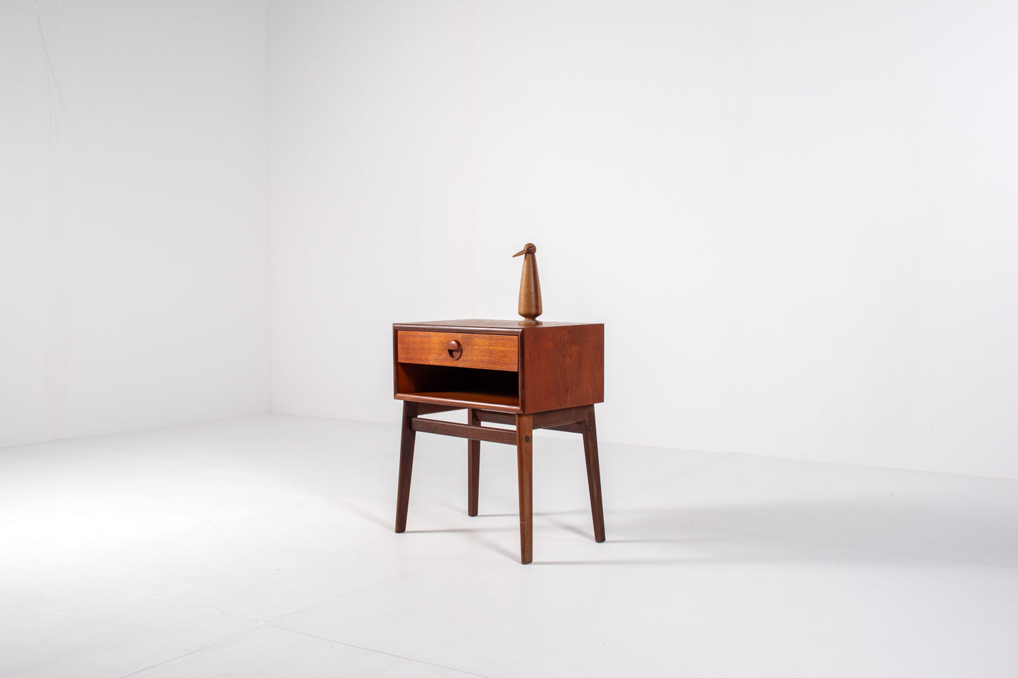 Vintage Danish teak nightstand with tapered legs and single drawer