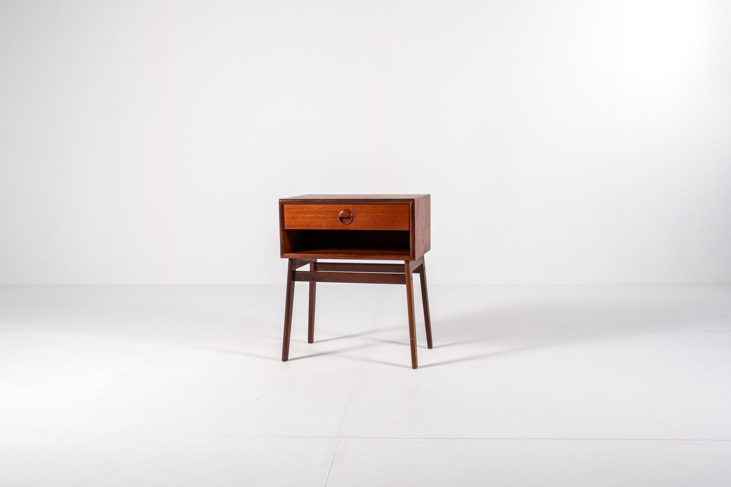 Vintage Danish teak nightstand with tapered legs and single drawer