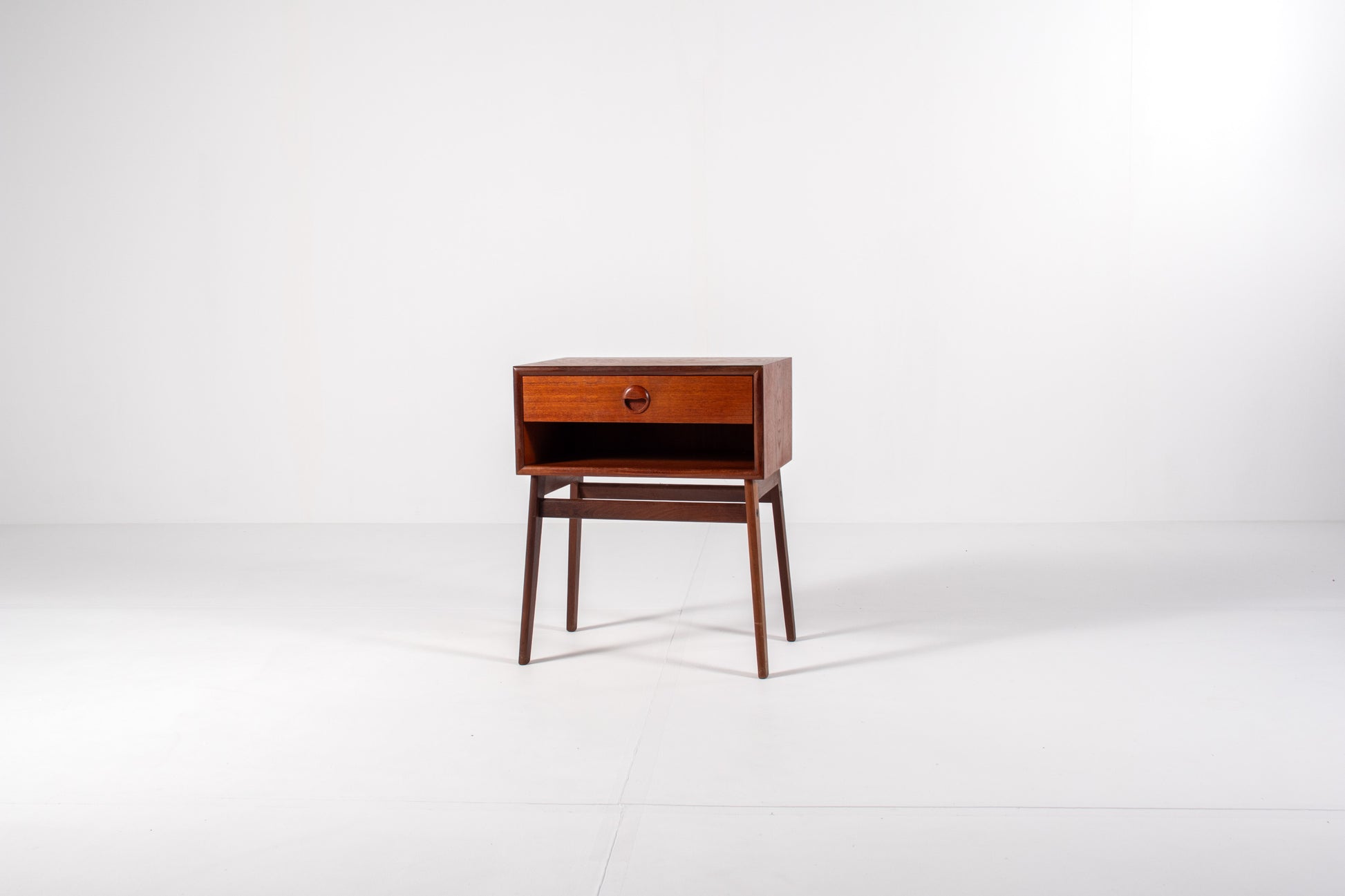 Vintage Danish teak nightstand with tapered legs and single drawer