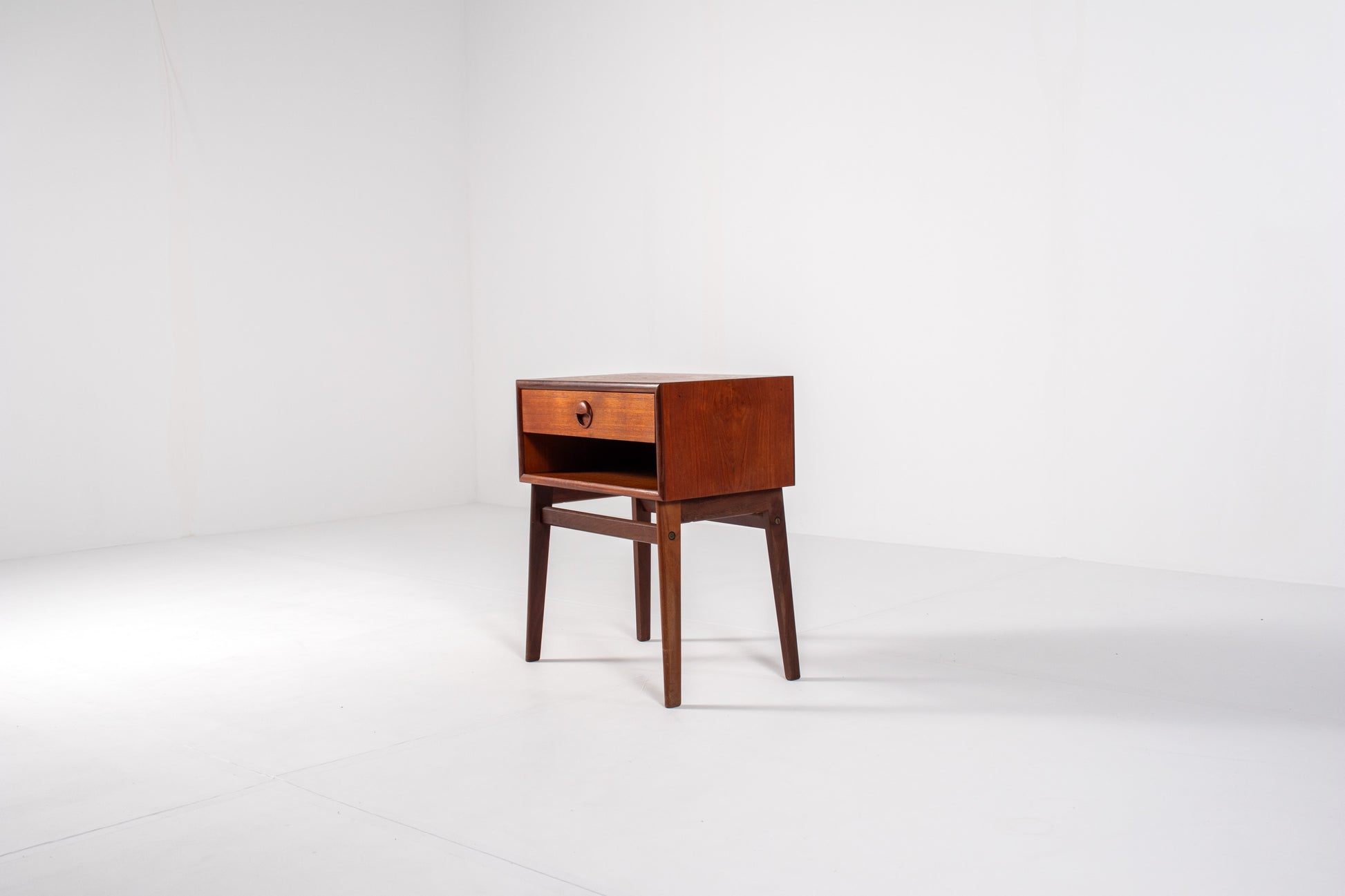 Vintage Danish teak nightstand with tapered legs and single drawer