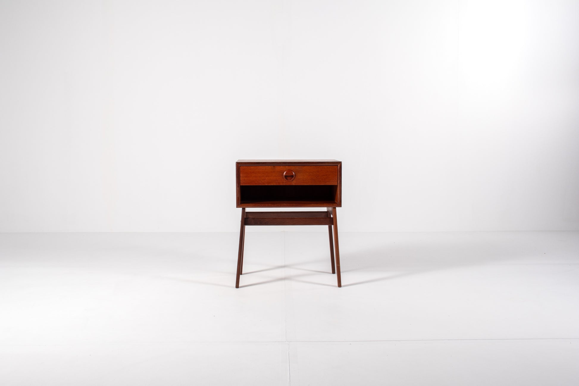 Vintage Danish teak nightstand with tapered legs and single drawer