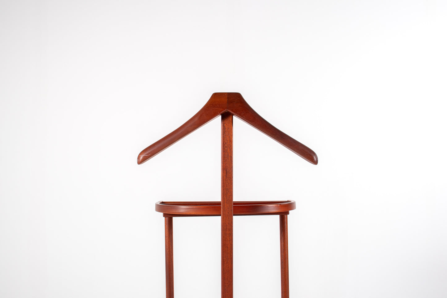 Vintage teak valet stand with sculpted hanger